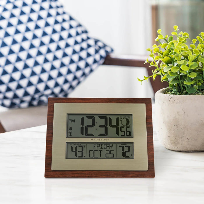 LaCrosse Technology 513-23137 Atomic Digital Wall Clock with Moon Phase, on Table